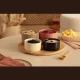 Lifestyle φωτογραφία: Το σετ ορεκτικών Bliss γεμάτο με dips και snacks σε στρωμένο τραπέζι.