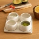 Χρήση του σετ Nora για dips όπως γουακαμόλε και sauces σε ξύλινο πάγκο.