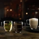 Κρυστάλλινες κούπες RCR Caffè 350ml σερβιρισμένες με τσάι, καφέ Americano και αφρώδη cappuccino.