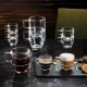 Η ολοκληρωμένη σειρά RCR Caffè, με την κούπα Americano 350ml σε πρώτο πλάνο γεμάτη με καφέ φίλτρου.