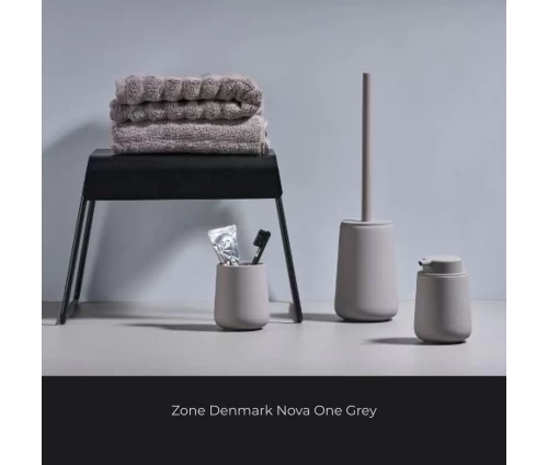 Πλήρες σετ μπάνιου Zone Denmark Nova One Grey με ντισπένσερ, ποτηράκι και πιγκάλ σε σύγχρονο περιβάλλον.